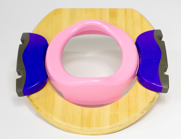 Pot Potette Plus rose en réducteur de toilettes